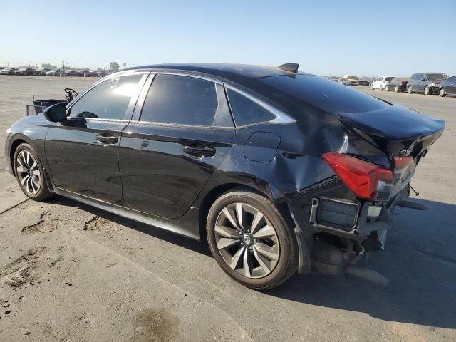 Photo 2 from auction – 2022 HONDA CIVIC EX with VIN 2HGFE1F72NH329776