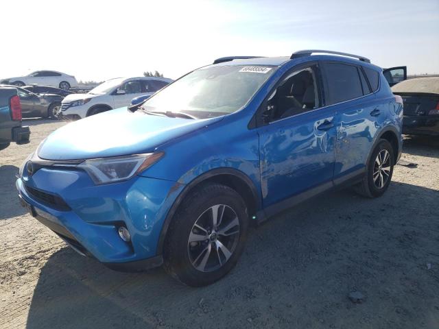 TOYOTA RAV4 ADVEN 2018 with VIN 2T3RFREV9JW838104 - Photo from auction