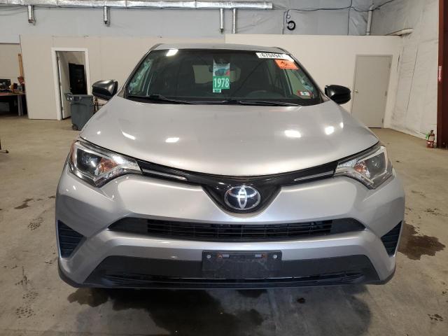 Photo 5 from auction – 2018 TOYOTA RAV4 LE with VIN JTMBFREV0JJ229127