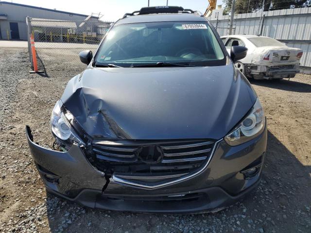 Photo 5 from auction – 2016 MAZDA CX-5 TOURI with VIN JM3KE2CY2G0764005