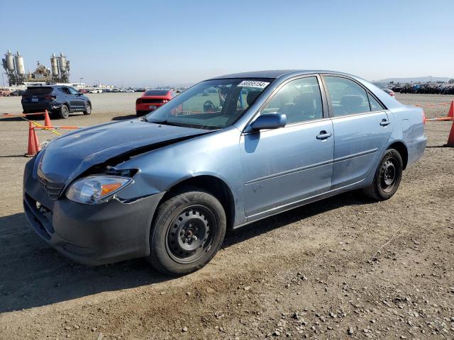 TOYOTA CAMRY LE 2003 with VIN JTDBE32K930238878 - Photo from auction