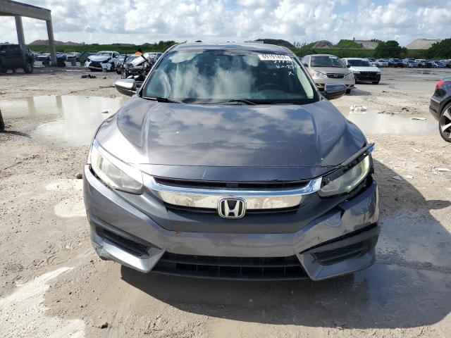 Photo 5 from auction – 2016 HONDA CIVIC LX with VIN 19XFC2F52GE038587