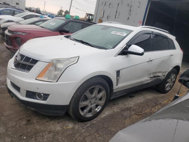 CADILLAC SRX PERFOR 2012 with VIN 3GYFNEE35CS603612 - Photo from auction