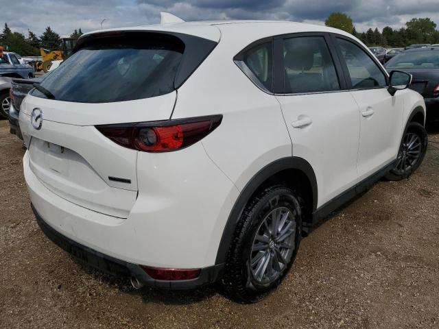 Photo 3 from auction – 2021 MAZDA CX-5 SPORT with VIN JM3KFBBM2M1304103
