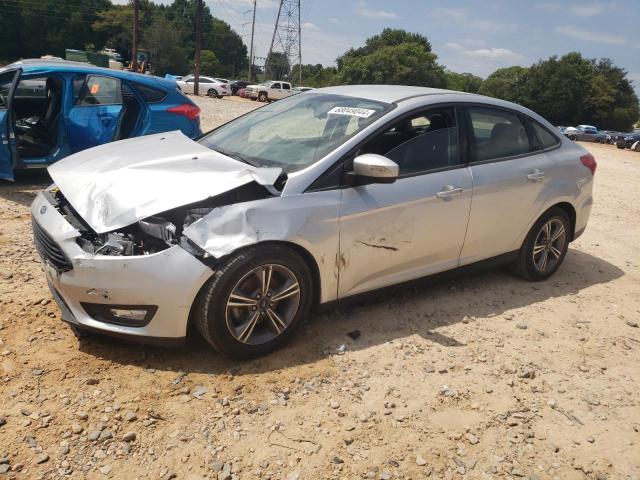FORD FOCUS SE 2018 with VIN 1FADP3FE7JL248690 - Photo from auction