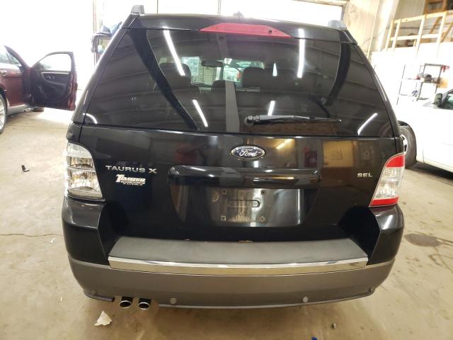 Photo 6 from auction – 2008 FORD TAURUS X S with VIN 1FMDK02W58GA13807