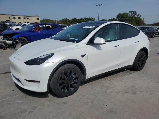 TESLA MODEL Y 2022 with VIN 7SAYGDEE0NF523105 - Photo from auction