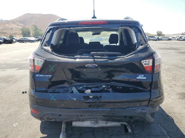 Photo 6 from auction – 2018 FORD ESCAPE SE with VIN 1FMCU0GD9JUB94351