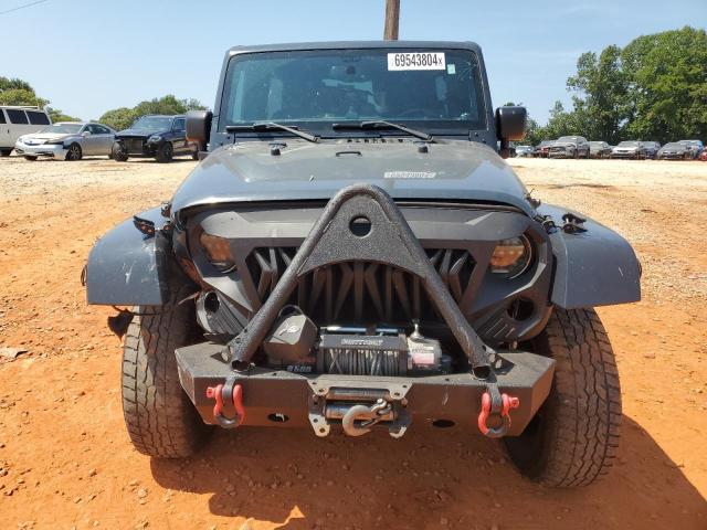 Photo 5 from auction – 2016 JEEP WRANGLER U with VIN 1C4BJWDG9GL210430