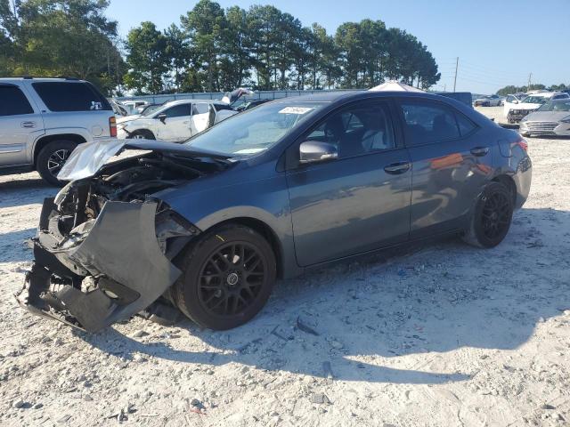 TOYOTA COROLLA L 2015 with VIN 2T1BURHE7FC324014 - Photo from auction
