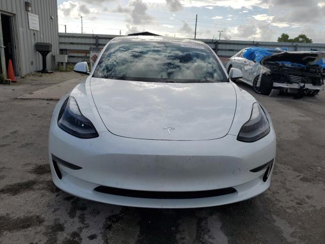 Photo 5 from auction – 2021 TESLA MODEL 3 with VIN 5YJ3E1EA8MF057933