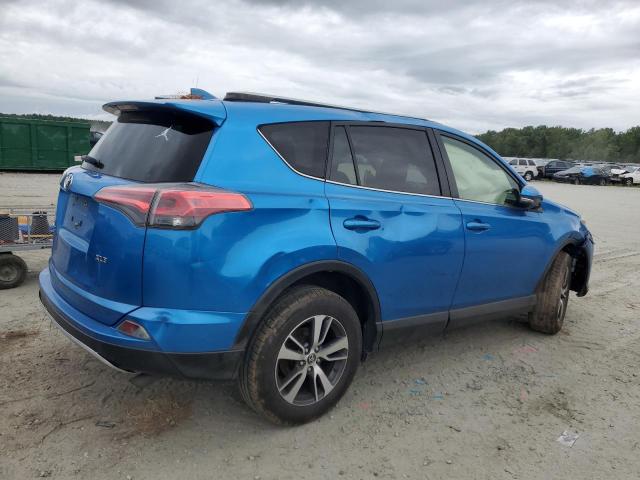 Photo 3 from auction – 2016 TOYOTA RAV4 XLE with VIN JTMWFREV1GJ088160