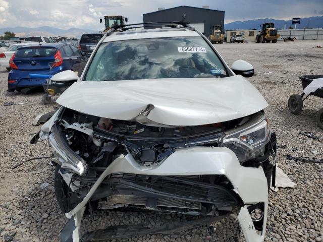 Photo 5 from auction – 2017 TOYOTA RAV4 HV LI with VIN JTMDJREV4HD138409