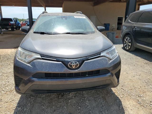 Photo 5 from auction – 2018 TOYOTA RAV4 LE with VIN JTMZFREV6JJ160541