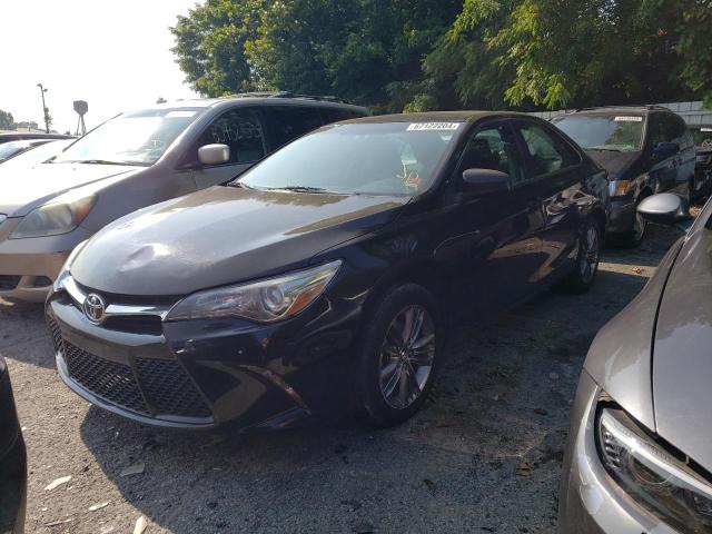 TOYOTA CAMRY LE 2017 with VIN 4T1BF1FKXHU689826 - Photo from auction