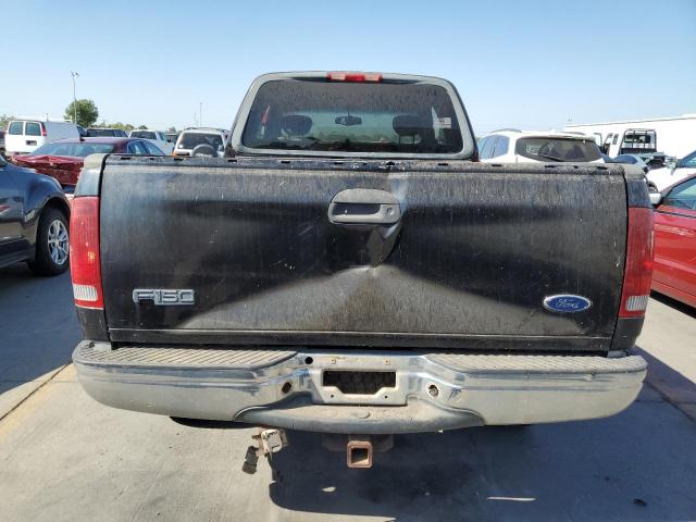 Photo 6 from auction – 2002 FORD F150 with VIN 1FTRX18L32NB36880