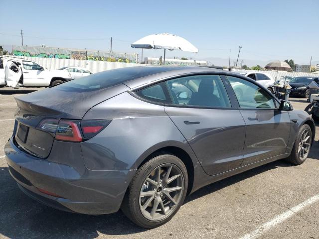 Photo 3 from auction – 2022 TESLA MODEL 3 with VIN 5YJ3E1EB7NF277493