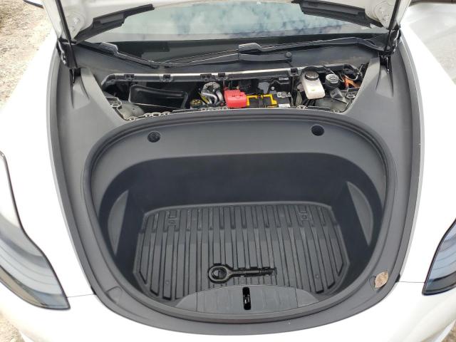 Photo 11 from auction – 2021 TESLA MODEL 3 with VIN 5YJ3E1EA5MF978183