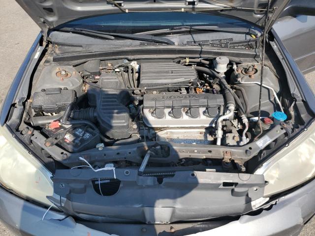 Photo 11 from auction – 2004 HONDA CIVIC LX with VIN 2HGES165X4H635903