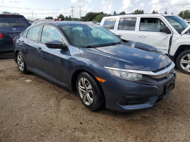 Photo 4 from auction – 2018 HONDA CIVIC LX with VIN 19XFC2F59JE022684