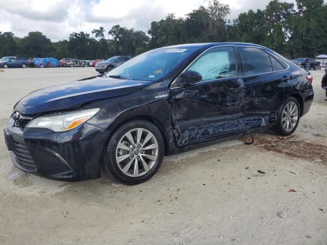 TOYOTA CAMRY HYBR 2016 with VIN 4T1BD1FK4GU178472 - Photo from auction
