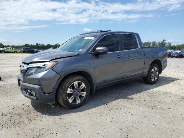 HONDA RIDGELINE 2018 with VIN 5FPYK3F6XJB003377 - Photo from auction