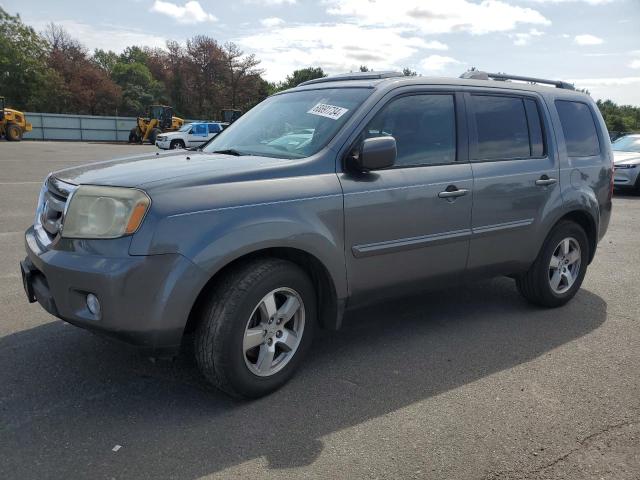 HONDA PILOT EXL 2010 with VIN 5FNYF4H5XAB022793 - Photo from auction