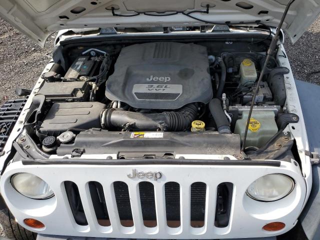Photo 11 from auction – 2013 JEEP WRANGLER U with VIN 1C4BJWDGXDL583133