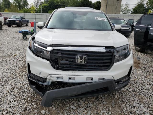 Photo 5 from auction – 2023 HONDA RIDGELINE with VIN 5FPYK3F55PB044466
