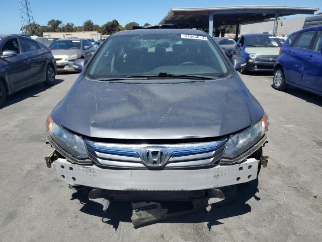Photo 5 from auction – 2012 HONDA CIVIC HYBR with VIN JHMFB4F2XCS003788