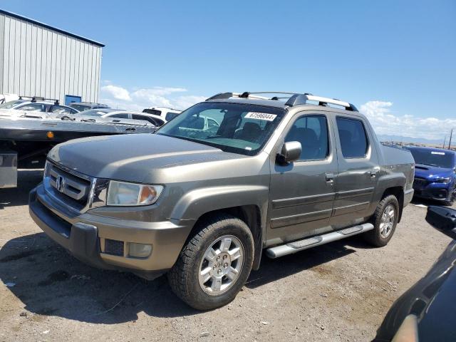 HONDA RIDGELINE 2011 с VIN 5FPYK1F4XBB005988 - Фото с аукциона