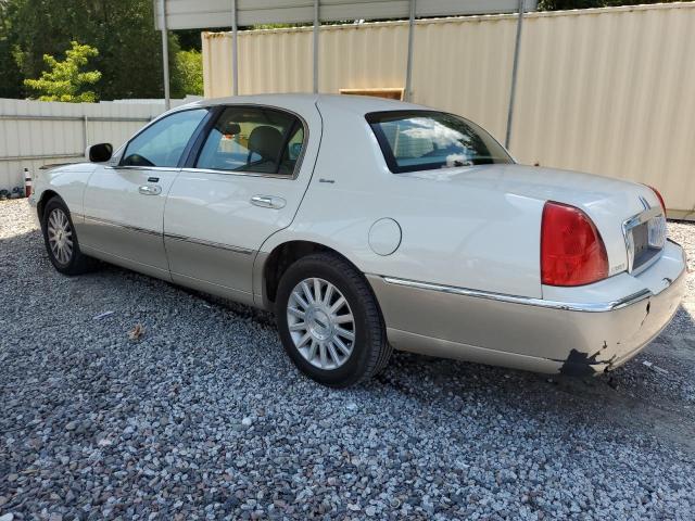 Photo 2 from auction – 2004 LINCOLN TOWN CAR U with VIN 1LNHM83W54Y674802