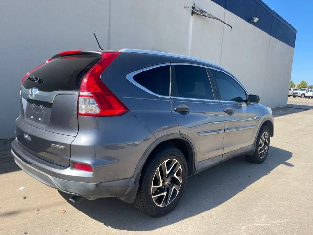 Photo 4 from auction – 2016 HONDA CR-V SE with VIN 2HKRM3H41GH521889