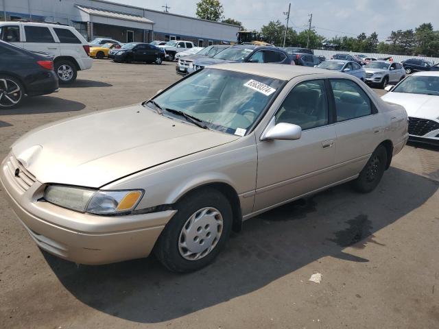 TOYOTA CAMRY CE 1998 with VIN JT2BG22K4W0124580 - Photo from auction