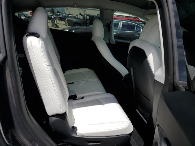 Photo 11 from auction – 2023 TESLA MODEL Y with VIN 7SAYGAEE6PF661104