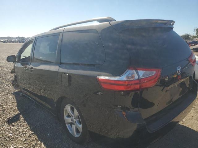 Photo 2 from auction – 2015 TOYOTA SIENNA LE with VIN 5TDKK3DC7FS680428
