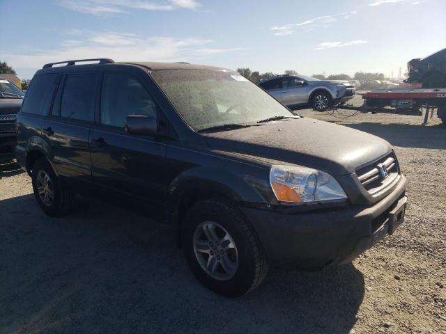 Photo 4 from auction – 2004 HONDA PILOT EX with VIN 2HKYF18414H506993