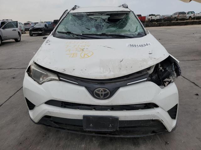 Photo 5 from auction – 2018 TOYOTA RAV4 LE with VIN JTMZFREV7JJ750263