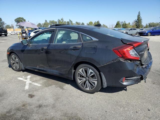 Photo 2 from auction – 2017 HONDA CIVIC EXL with VIN 2HGFC1F78HH650148