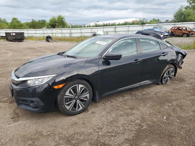 HONDA CIVIC EXL 2017 with VIN 19XFC1F76HE011308 - Photo from auction