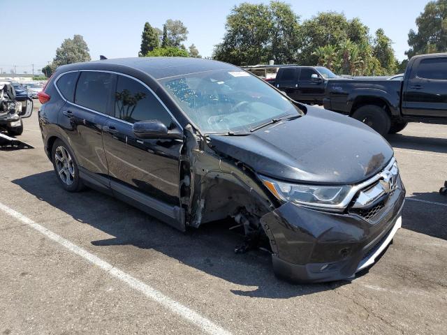Photo 4 from auction – 2018 HONDA CR-V EX with VIN 2HKRW2H54JH675615