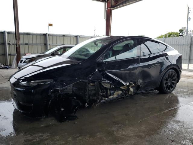 TESLA MODEL Y 2022 with VIN 7SAYGDEE8NA005983 - Photo from auction