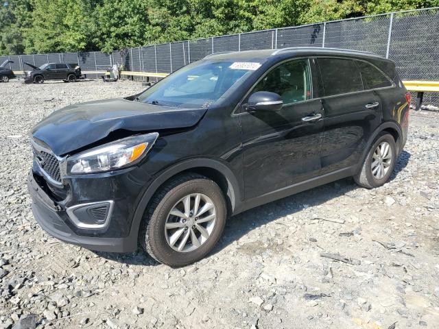KIA SORENTO LX 2018 with VIN 5XYPG4A39JG357327 - Photo from auction