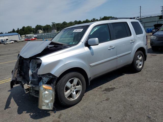 HONDA PILOT EXL 2011 with VIN 5FNYF4H52BB076266 - Photo from auction