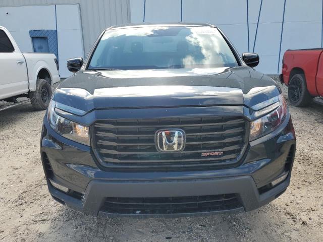 Photo 5 from auction – 2023 HONDA RIDGELINE with VIN 5FPYK3F10PB049216