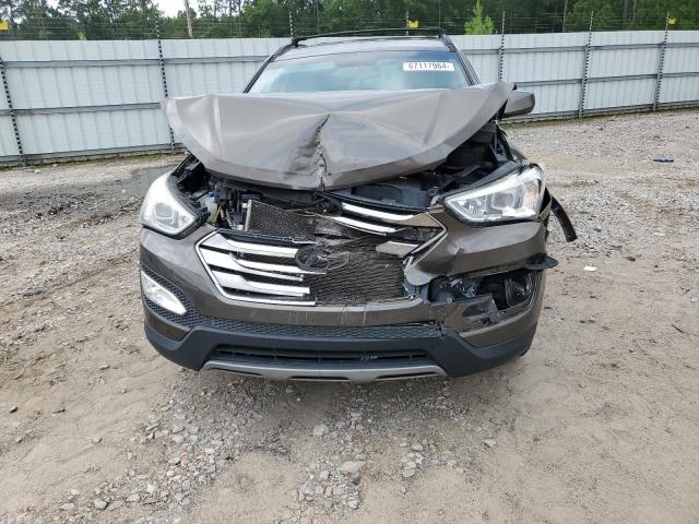 Photo 5 from auction – 2014 HYUNDAI SANTA FE S with VIN 5XYZU3LB4EG213903