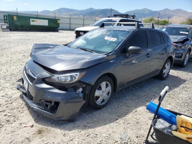 SUBARU IMPREZA 2019 with VIN 4S3GTAA63K3717301 - Photo from auction