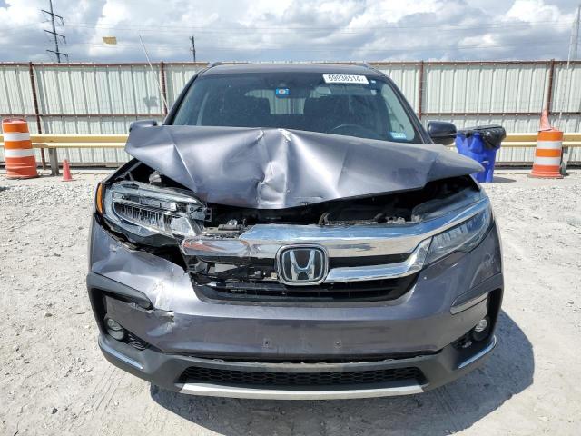 Photo 5 from auction – 2021 HONDA PILOT ELIT with VIN 5FNYF6H05MB057858