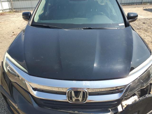 Photo 12 from auction – 2021 HONDA PILOT EXL with VIN 5FNYF5H56MB029637