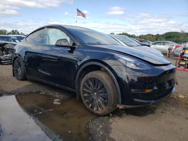 Photo 4 from auction – 2023 TESLA MODEL Y with VIN 7SAYGAEE8PF959024